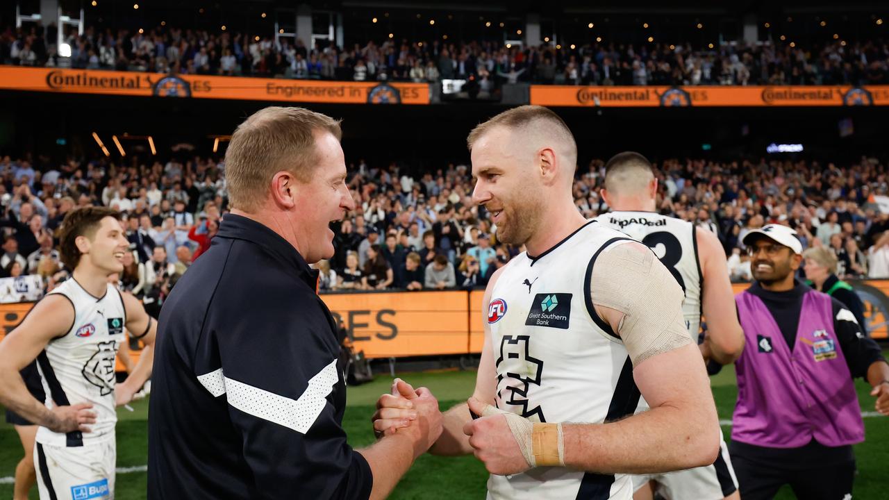 Carlton coach Michael Voss shares a moment with Sam Docherty after he starred in the final term of the two-point semi-final win. Picture: Dylan Burns / Getty Images