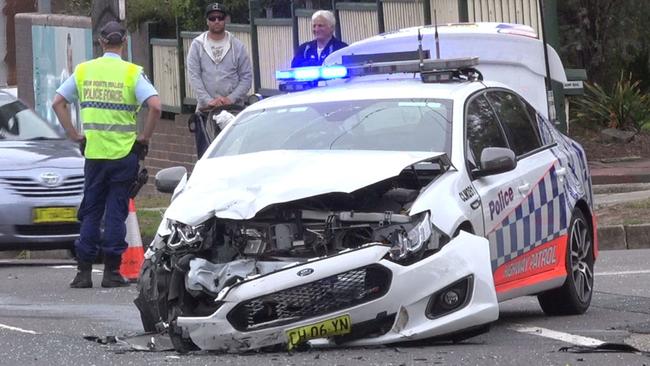 The male senior constable driving the police car was treated for facial injuries. Picture: TNV