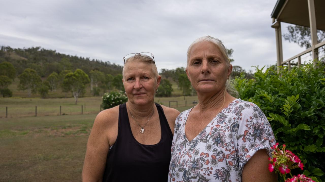 Hobby farmer Mardi Brady stands outside her house in Kilkivan with her neighbour Sandra Murray. Both of their properties are on one of the proposed transmission line routes. Picture: Christine Schindler