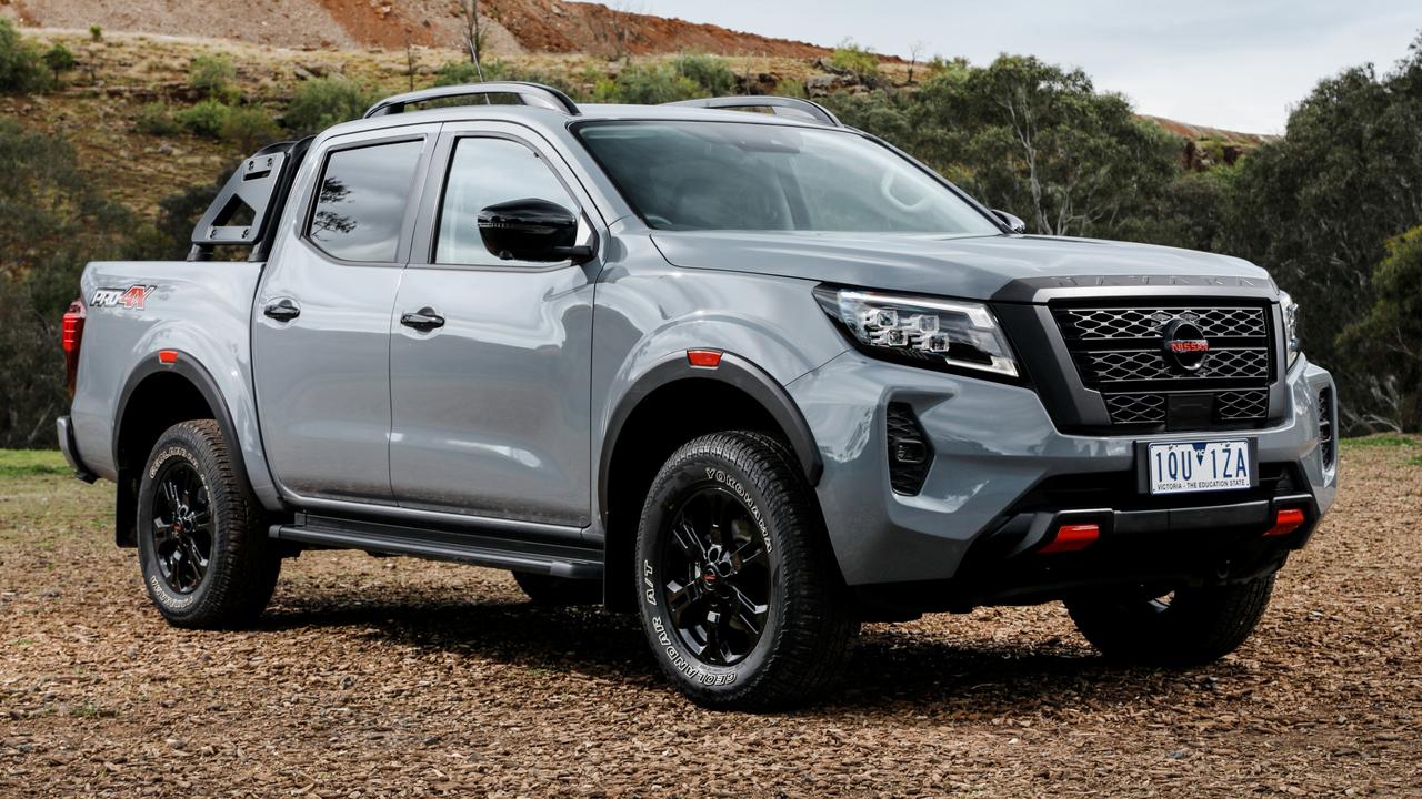 Nissan's Navara Pro-4X sits atop of the range with features including bulging black wheel arches with red highlights house robust all-terrain tyres, while behind the cabin there's a black sports bar with side sail planes.