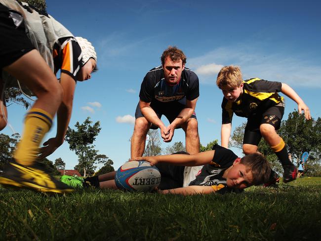 McDuling during a coaching clinic at his alma mater, Riverview. Picture: Phil Hillyard