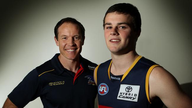 Brad Crouch with then Crows coach Brenton Sanderson after being drafted.