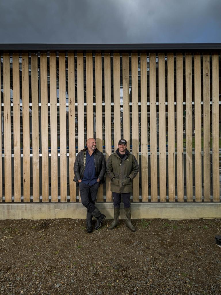 Farm owner Nick Haddow and manager Richard Butler at the dairy. Picture: Phillip Biggs