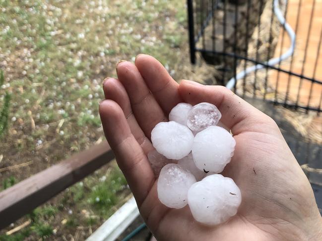 Severe thunderstorms have brought hail to Brisbane's northern suburbs, like this at McDowall. Picture: Amy Price