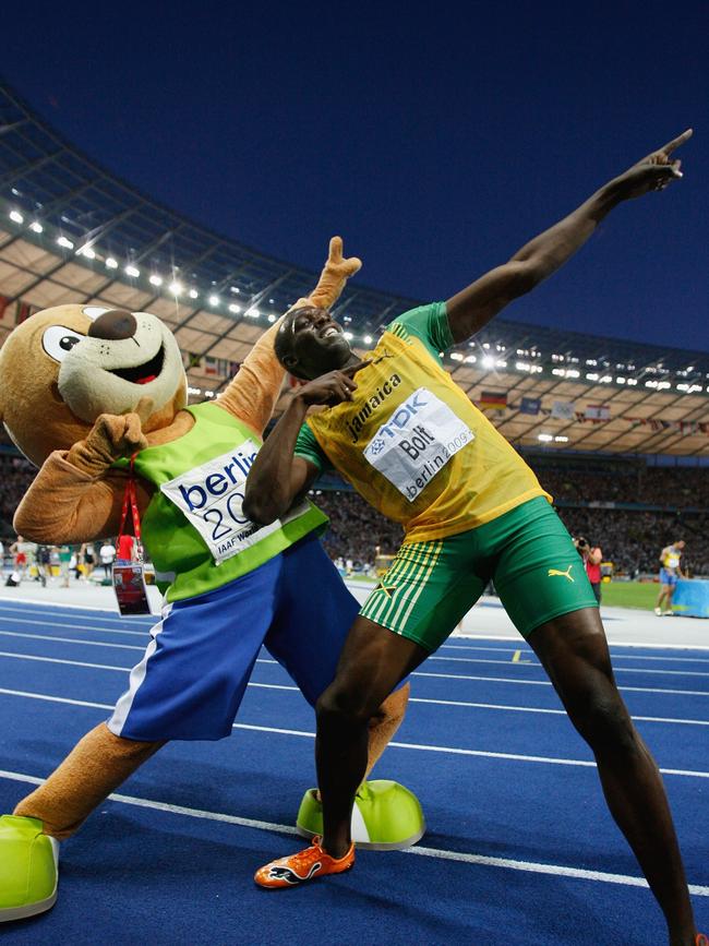 Bolt strikes his famous pose as he celebrates winning the gold medal in the men’s 200 Metres Final at the World Athletics Championships on August 20, 2009 in Berlin. Bolt set a new World Record of 19.19 seconds. Picture: Getty