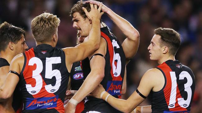 Essendon players plan to throw their arms around Joe Daniher when he returns to the club. Picture: Getty Images