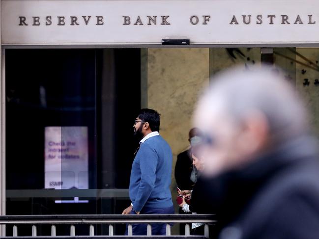 Commuters walk past the Reserve Bank of Australia (RBA) building on June 07, 2022 in Sydney, Australia. The Reserve Bank of Australia raised the cash rate by 0.5 per cent to 0.85 per cent. Picture: Brendon Thorne