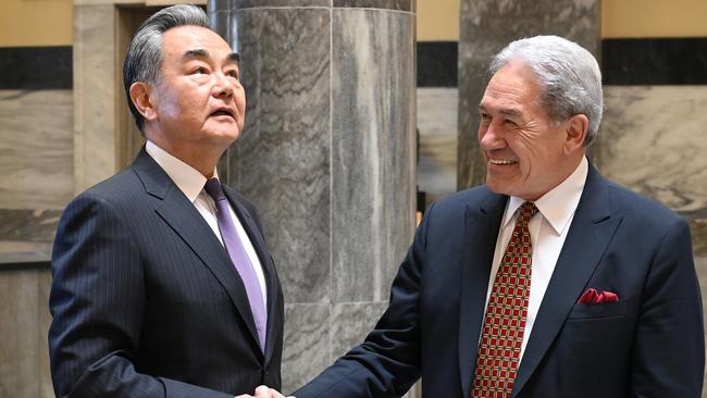 New Zealand’s Deputy Prime Minister Winston Peters with Chinese Foreign Minister Wang Yi on Tuesday. Picture: AAP