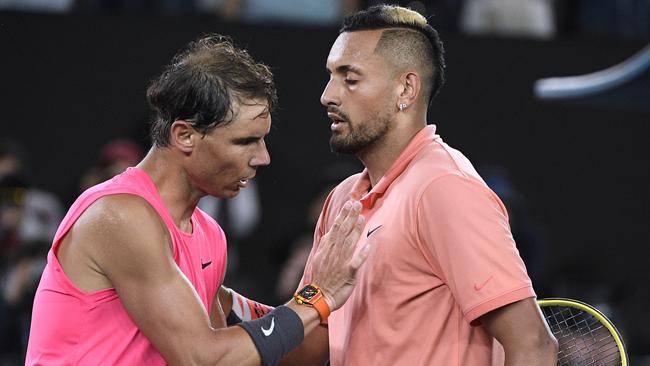 Spain's Rafael Nadal, left, is congratulated by Australia's Nick Kyrgios after winning their fourth round singles match at the Australian Open tennis championship.