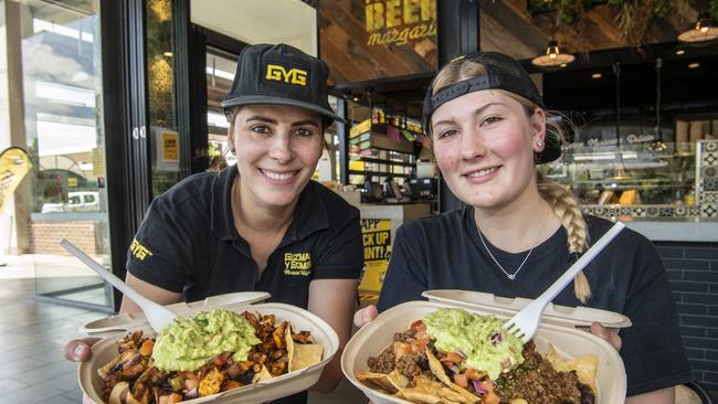 Catalina Henao and Mykaila Saal with the 2 for 1 nachos deal at Guzman Y Gomez.