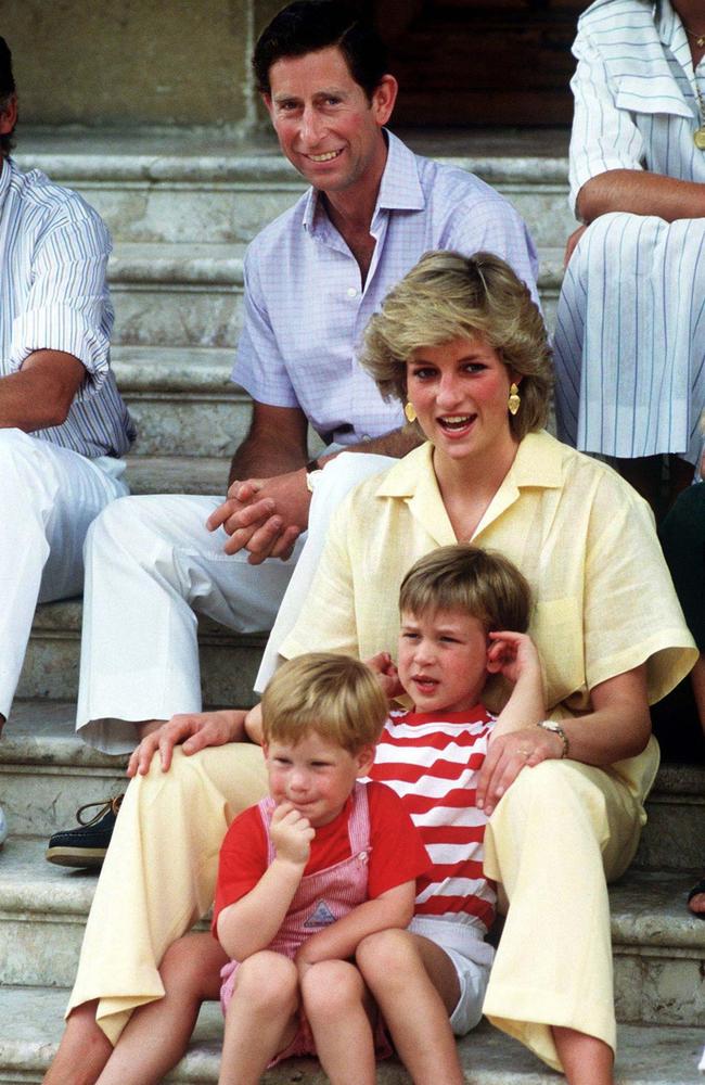 The Prince and Princess of Wales on holiday with their children, Princes William and Harry, at the Spanish royal residence Marivent Palace, in August 1987. Picture: Getty