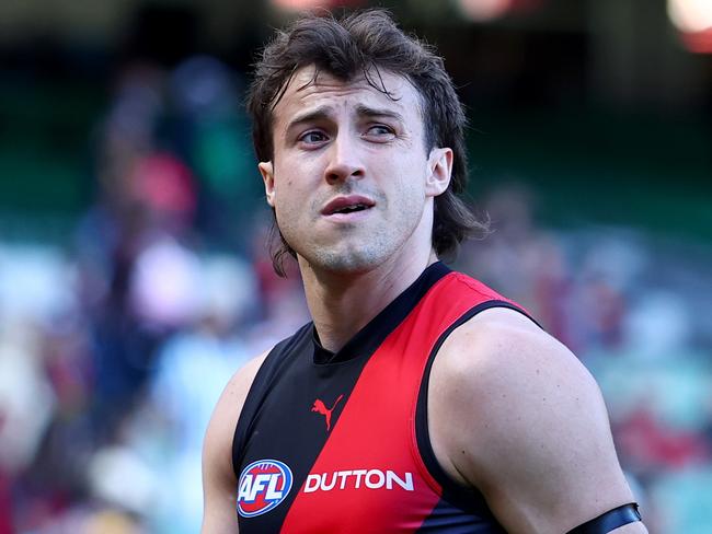 MELBOURNE, AUSTRALIA - MARCH 22: Andrew McGrath of the Bombers looks dejected after losing the round two AFL match between Essendon Bombers and Adelaide Crows at Melbourne Cricket Ground, on March 22, 2025, in Melbourne, Australia. (Photo by Josh Chadwick/AFL Photos/via Getty Images)