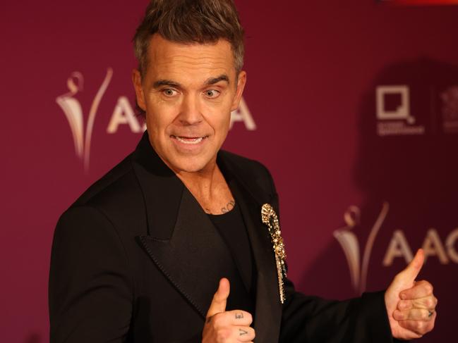 Robbie Williams  on the red carpet at the Australian Academy of Cinema and Television Arts (AACTA) awards at the Home of the Arts on the Gold Coast, Friday, February 7, 2025. Picture: Annette Dew.