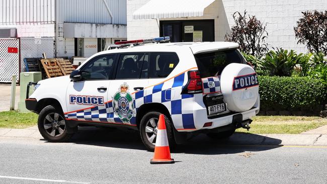 A Queensland Police car remained at the scene at 2pm on Thursday. Picture: Brendan Radke