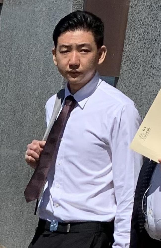 Bai Eng Lee leaves Taree Local Court with his lawyer on December 14.