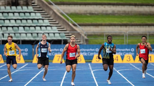 Connor Bond from Pymble takes control of the 200m sprint final.