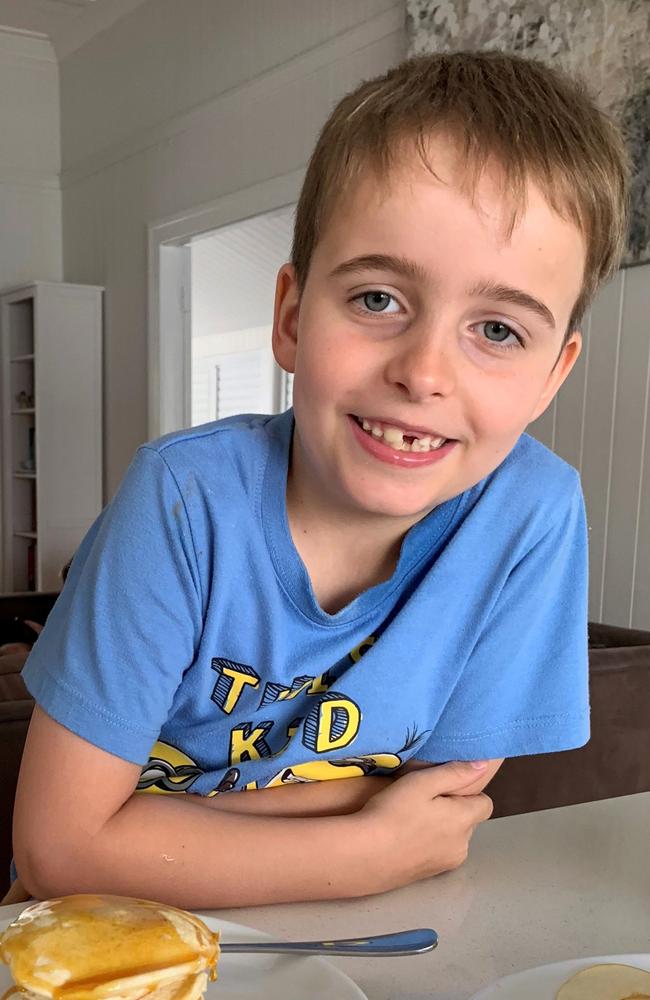 Alfie, 7, snapped by his family at home. Picture: Caters News