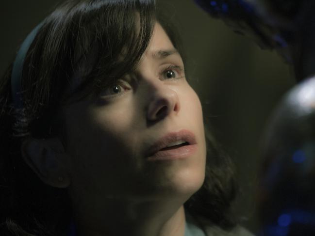 This image released by Fox Searchlight Pictures shows Sally Hawkins, left, and Doug Jones in a scene from the film "The Shape of Water." Guillermo del Toroâ€™s Cold War fantasy romance leads all nominees for the Criticsâ€™ Choice Awards with 14 bids. The awards ceremony will be held on Thursday, Jan. 11. (Kerry Hayes/Fox Searchlight Pictures via AP)