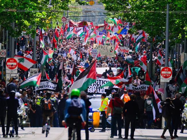 Pro-Palestinian protesters gather at a rally in Melbourne on Sunday, October 6, 2024.