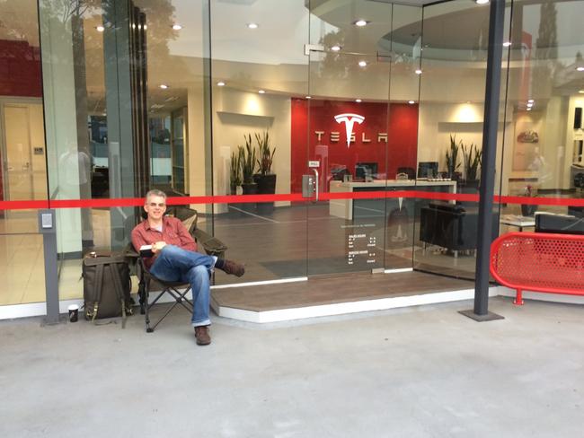Andreas Stephens and other Tesla buyers outside the Tesla shop to place their order for a Tesla Model3