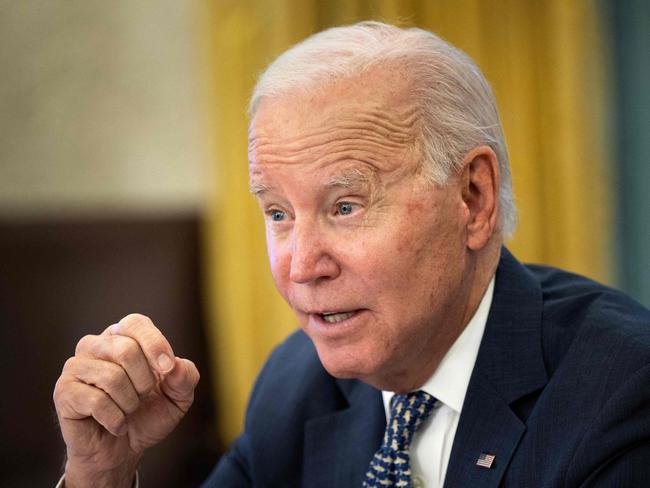 US President Joe Biden speaks during a briefing on the winter storm system traversing the US and the expected impacts, in the Oval Office of the White House in Washington, DC, on December 22, 2022. (Photo by Brendan Smialowski / AFP)