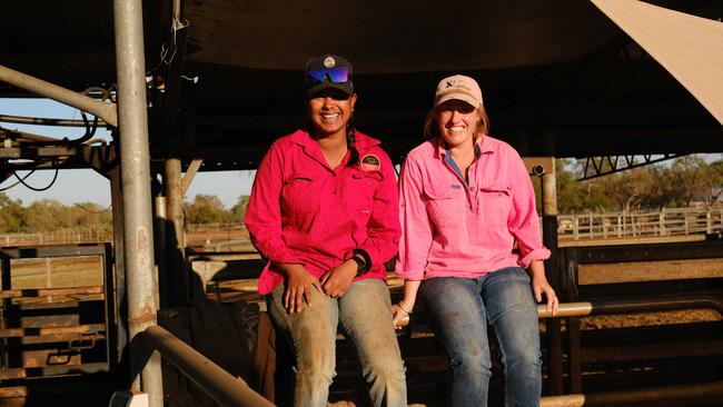 Workers at the yard spraying cattle at Gumaranganyjal, Roebuck Plains Cattle Station.