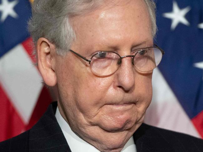 (FILES) In this file photo taken on November 10, 2020 US Senate Majority Leader Mitch McConnell, Republican of Kentucky, speaks to the media following the weekly Senate Republican lunch on Capitol Hill in Washington, DC. - The supporters of Donald Trump who attacked the US Capitol were "provoked" by the president and "fed lies," Senate Republican Majority Leader Mitch McConnell said on January 19, 2021. "The mob was fed lies," the senator from Kentucky said in a speech on the Senate floor. (Photo by SAUL LOEB / AFP)