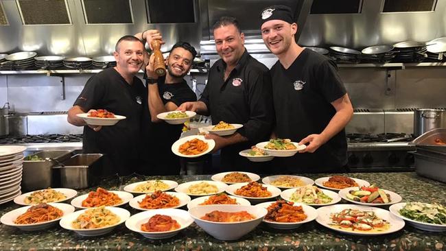 Alexi Spyridis (second from right) with the Italian Bowl cooks, who run their open kitchen with military precision. Picture: Facebook