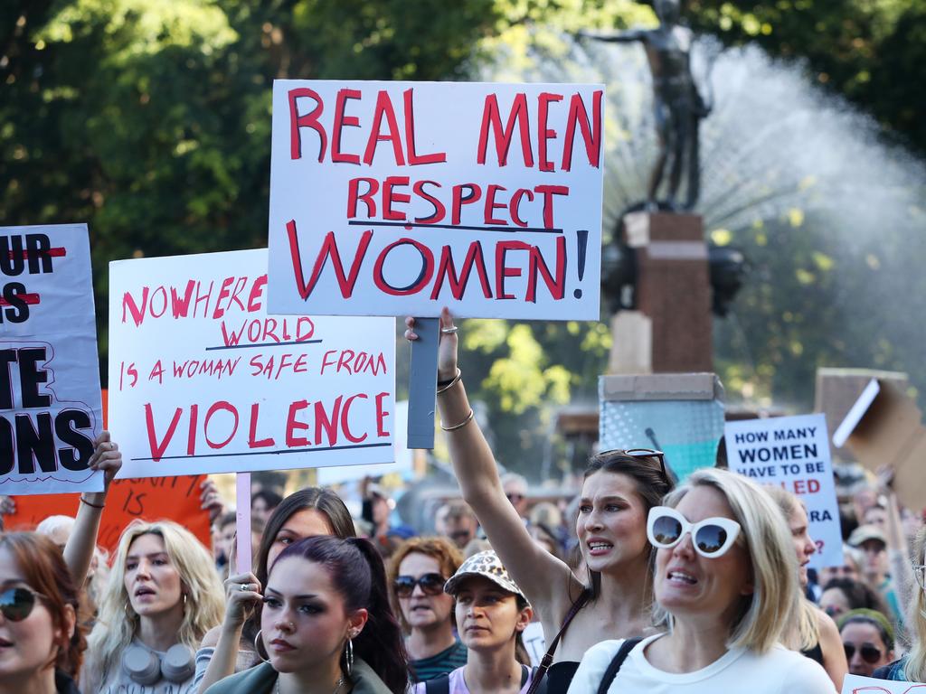 Demonstrators take part in a national rally against violence against women in Sydney on Saturday. Picture: Lisa Maree Williams/Getty Images