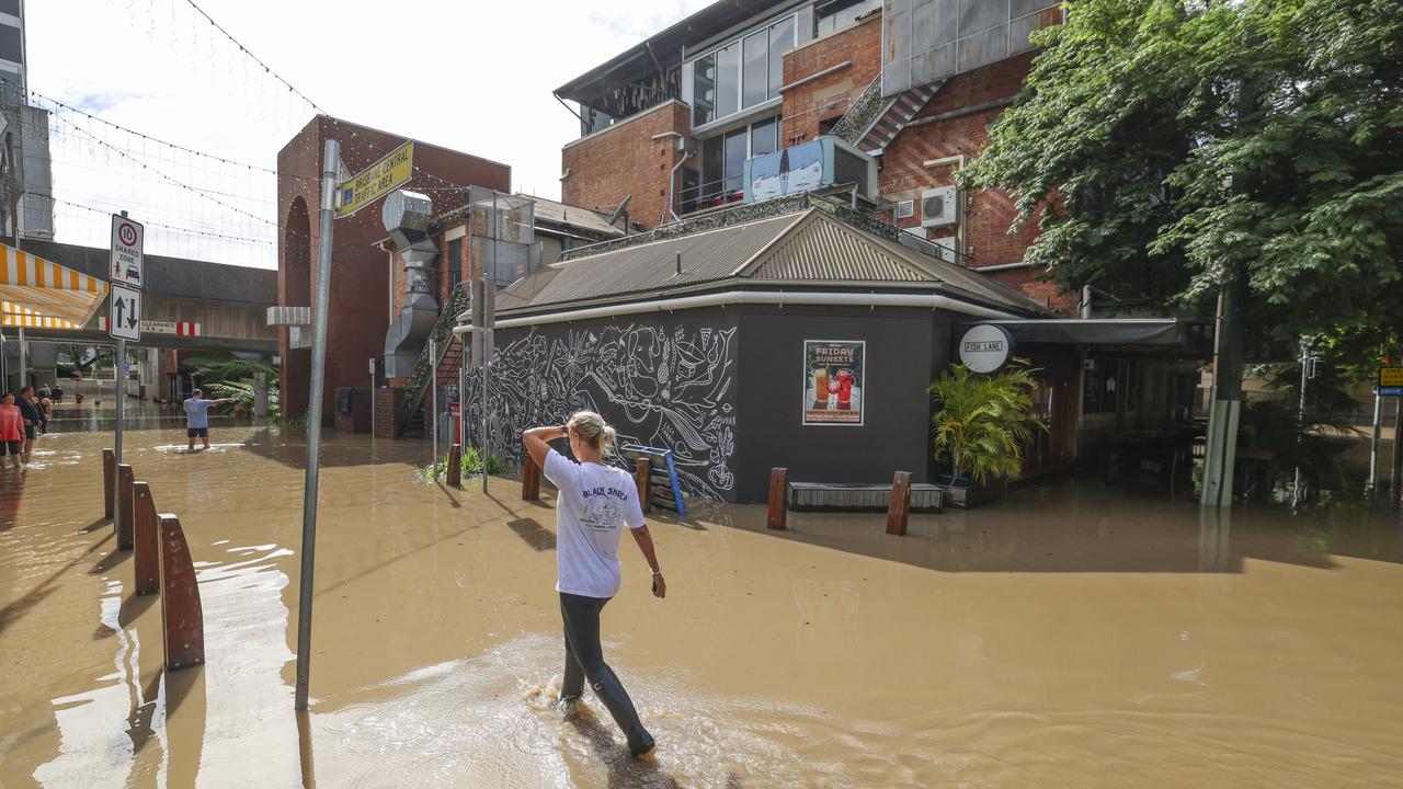 A feast of restaurants along South Brisbane’s Fish Lane received water damage. Picture: Peter Wallis