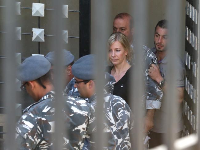 Sally Faulkner led away from court to prison van at the back of the Palace of Justice, Baabda, Lebanon. Picture: Liam Kidston.