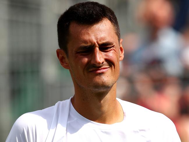 LONDON, ENGLAND - JULY 02: Bernard Tomic of Australia reacts in his Men's Singles first round match against Jo-Wilfred Tsonga of France during Day two of The Championships - Wimbledon 2019 at All England Lawn Tennis and Croquet Club on July 02, 2019 in London, England. (Photo by Clive Brunskill/Getty Images)