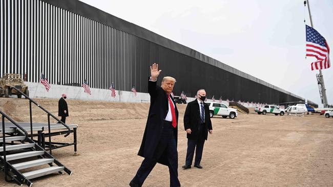 Donald Trump waves after touring a section of the border wall in Alamo, Texas in January 2021. Picture: Mangel Ngan/AFP