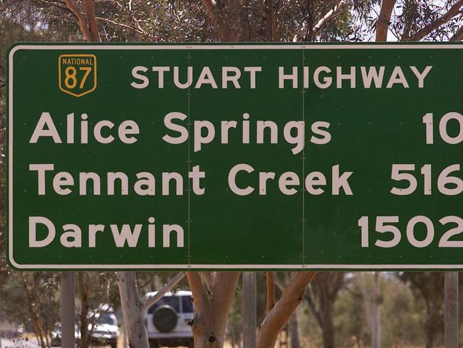 ## HAVE YOU /CHECKED COPYRIGHT /CLEARANCE ?? Road sign on Stuart Highway displaying distances to Alice Springs, Tennant Creek and Darwin 25 Sept 2002. signs travel NT