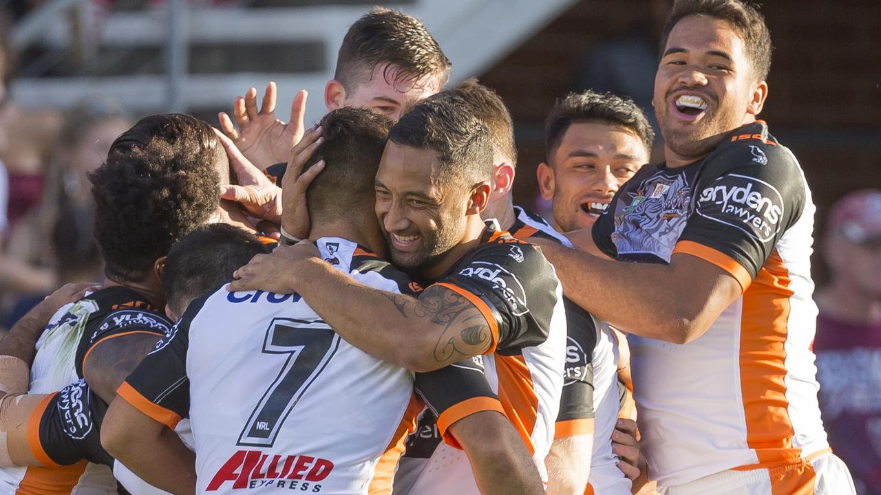 Benji Marshall and his Wests Tigers teammates celebrate another try against the Sea Eagles last weekend. Photo: Craig Golding
