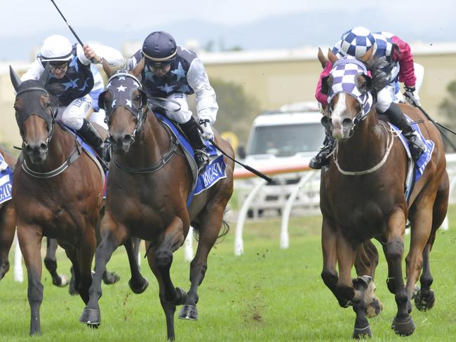 Basic Strategy (black cap) denies Rideonabigjetplane (right) in a photo finish. Pictures: Jessica Hawkins.