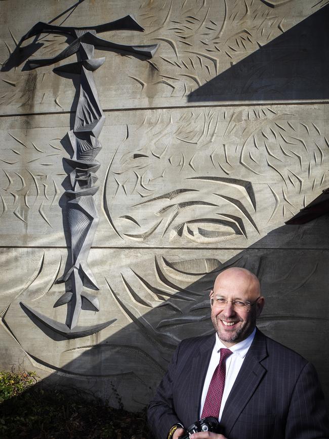 Adam Walker in front of his fathers untitled sculpture (Stephen Walker) that will be incorporated into a hospital development at New Town. Picture Chris Kidd