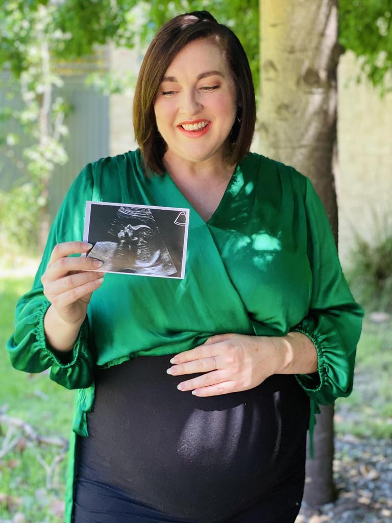 Badcoe MP Jayne Stinson holds her ultrasound photo.