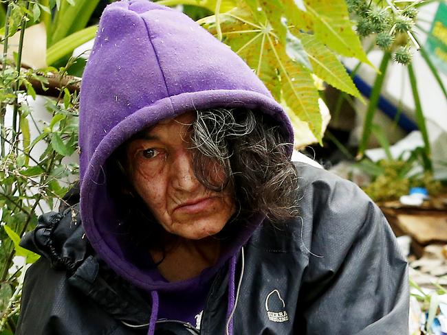 Mary Bobolas (pictured in her front yard) loves reading and cooking and believes people should ‘be kinder to each other’. Picture: John Appleyard