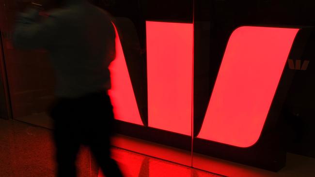 The Westpac Bank logo is reflected on the floor of a shopping centre in Sydney, 28/07/2011.