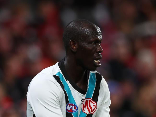 MELBOURNE, AUSTRALIA – JUNE 30: Aliir Aliir of the Power in action during the round 16 AFL match between St Kilda Saints and Port Adelaide Power at Marvel Stadium on June 30, 2024 in Melbourne, Australia. (Photo by Graham Denholm/AFL Photos/via Getty Images)