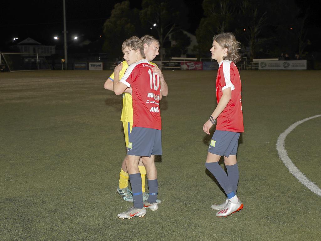 Lokoseljac Cup Final at KGV. Devonport Strikers versus South Hobart. South Hobart's Bradley Lakoseljac and Devonport's Edward Bidwell hug after the match. Picture: PATRICK GEE