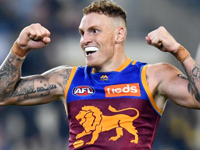 Mitch Robinson of the Lions is seen celebrating during the Round 18 AFL match between the Brisbane Lions and the North Melbourne Kangaroos at the Gabba in Brisbane, Saturday, July 20, 2019.  (AAP Image/Darren England) NO ARCHIVING, EDITORIAL USE ONLY