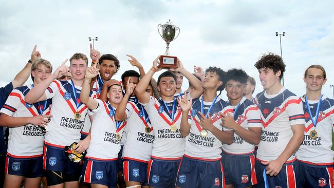 The Central Coast Roosters celebrate after winning the grand final. Photo: Sue Graham