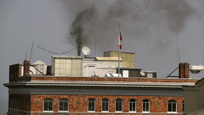 Black smoke billows from a chimney on top of the Russian consulate on September in San Francisco. Picture: AFP