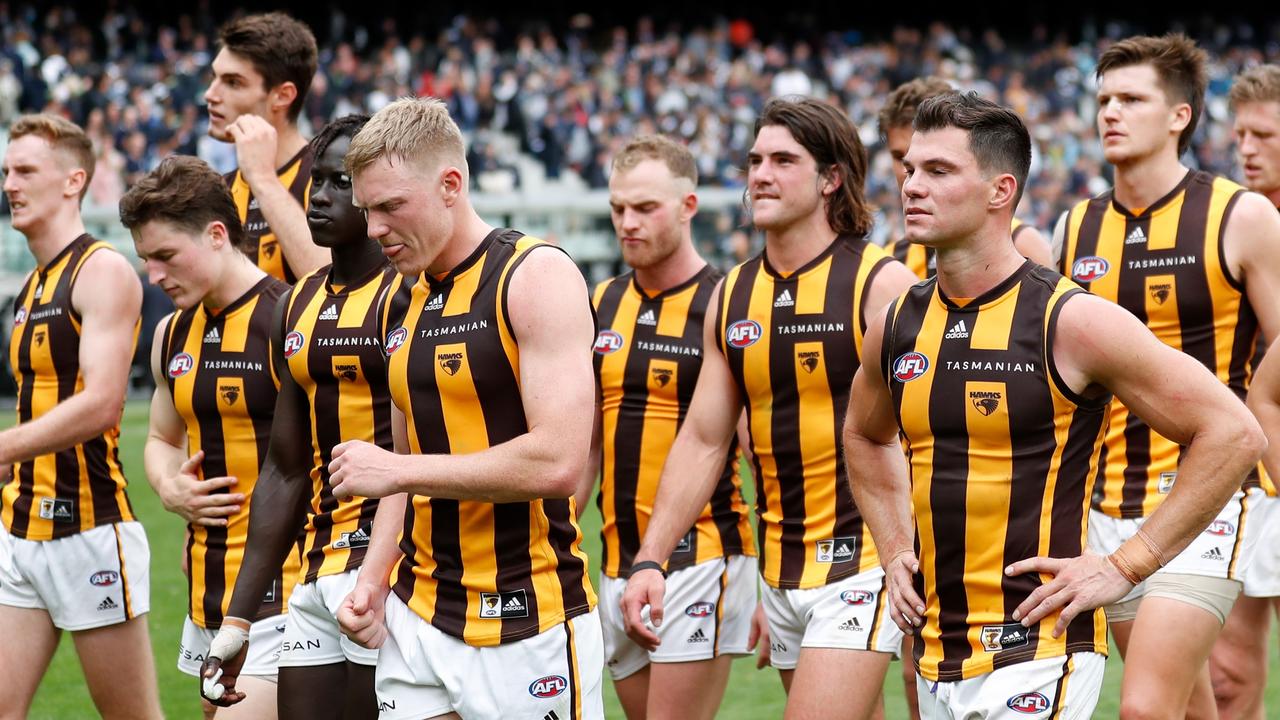 Jaeger O’Meara and his teammates walk off after their one-point loss to Carlton.