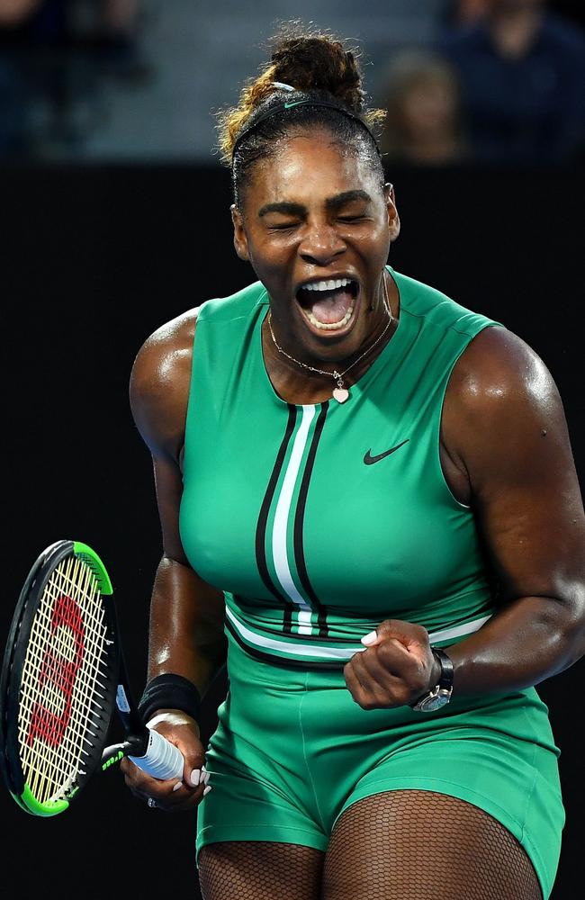 Serena Williams showing off her compression fishnets mid-victory pose. Picture: Getty Images 