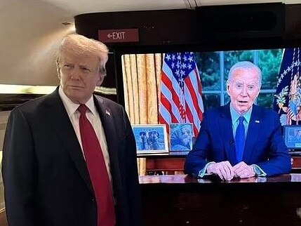 Donald Trump looks quizzical as he watches Joe Biden's speech.