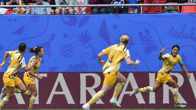 Sam Kerr of Australia celebrates after scoring the opening goal