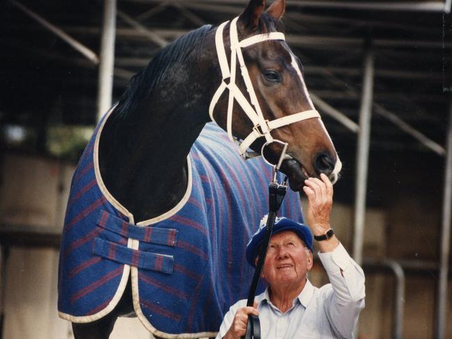 Trainer George Hanlon with racehorse Our Pompeii at Morphettville stables in 1995.